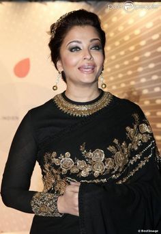 Black saree with full sleeve blouse
