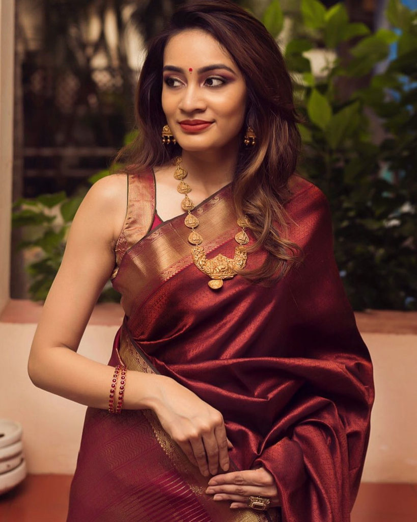Maroon colour sleeveless blouse designs for silk sarees