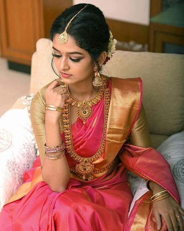 Pink Saree with Golden Blouse