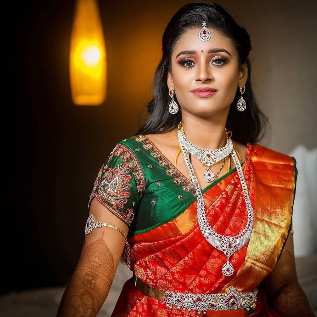 Red Saree with green blouse