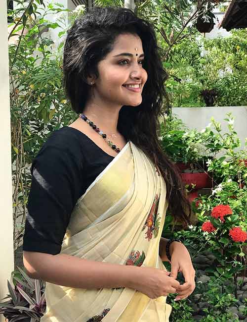 Kerala saree with black brocade blouse