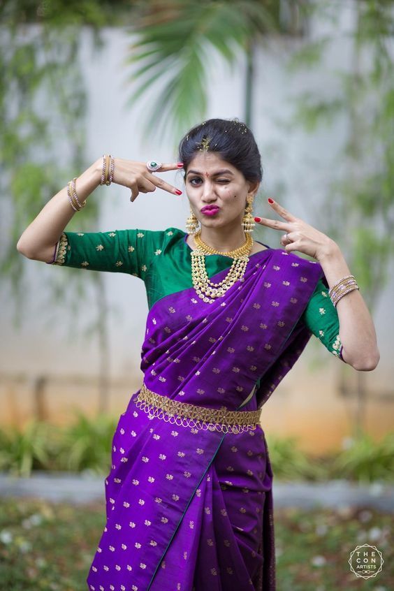 purple saree with green blouse