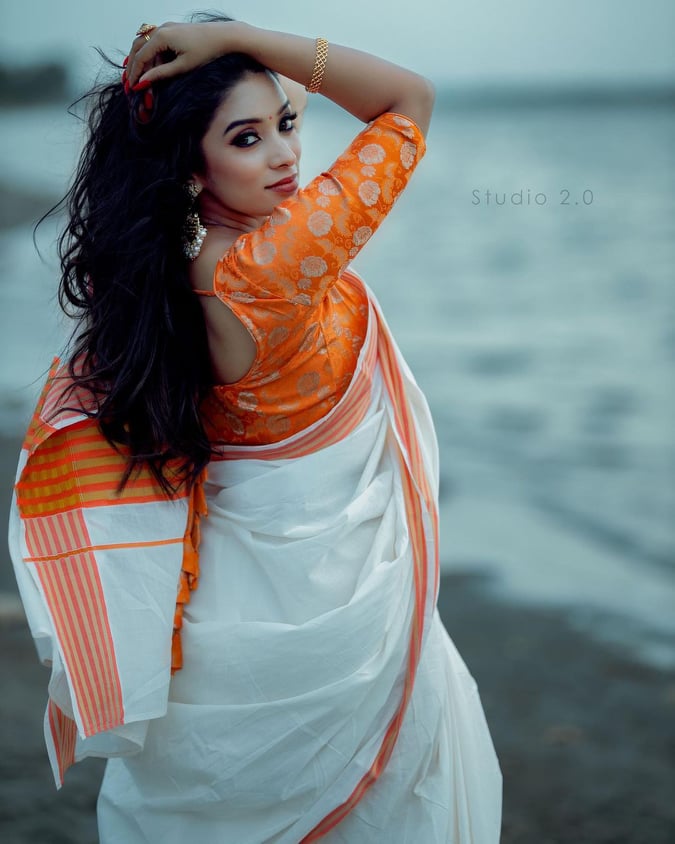 White Saree Orange blouse