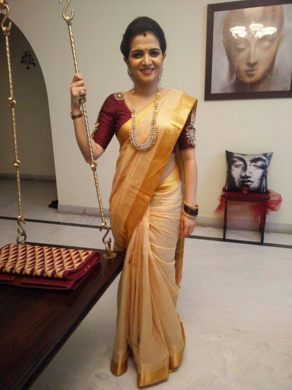 Gold Saree with Maroon Blouse: