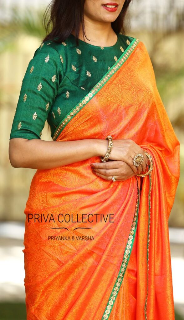 Plain Orange Saree with Green Blouse