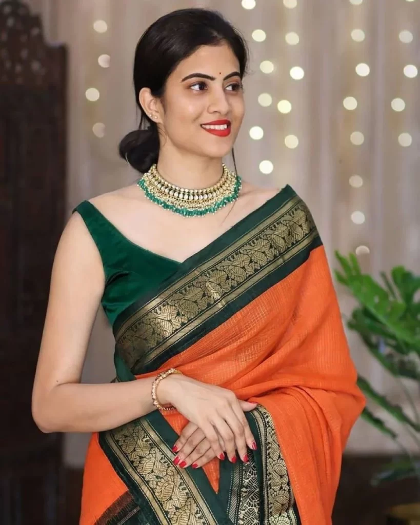 Orange Saree with Dark Green Blouse